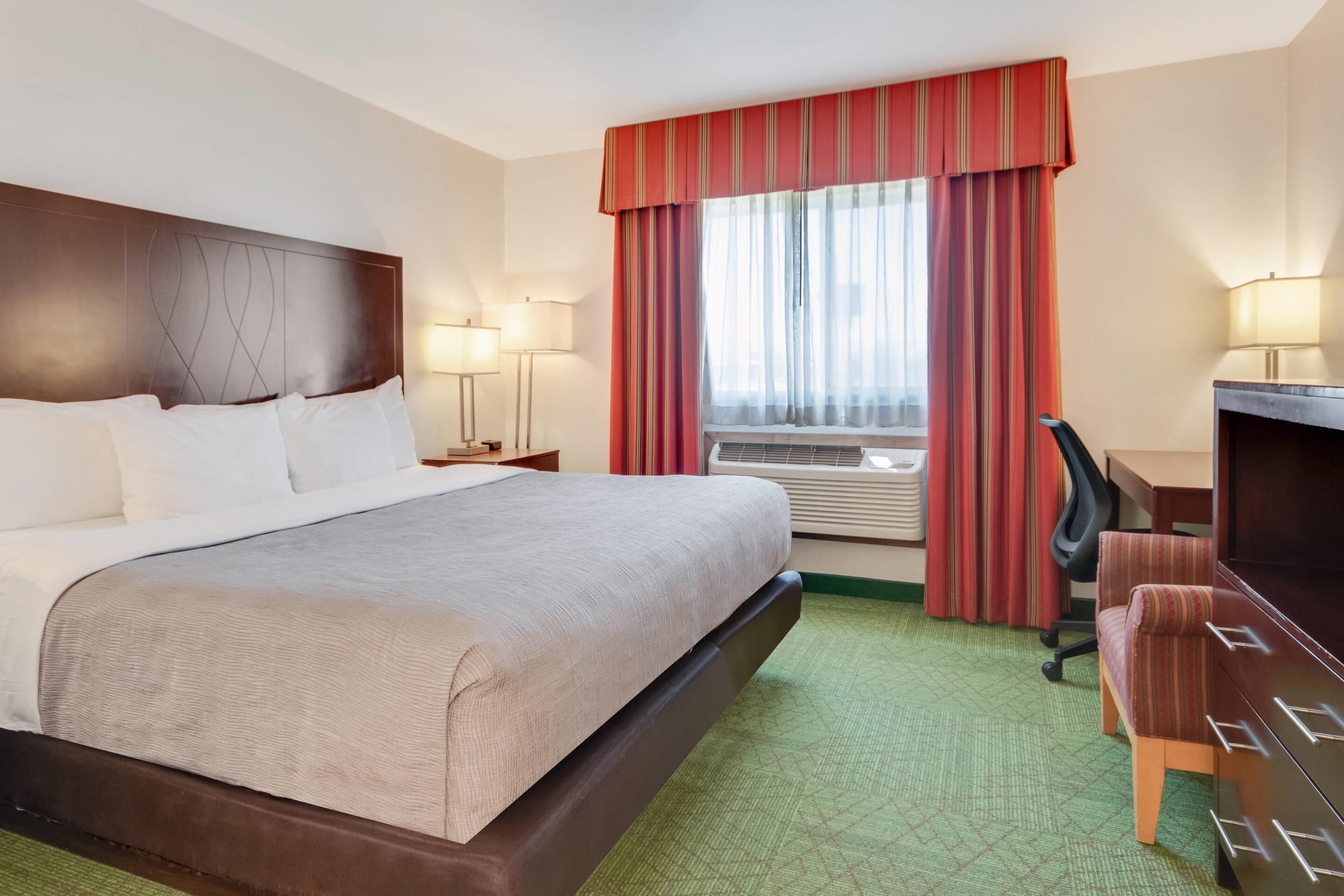 desk, blackout curtains, iron/ironing board, bed sheets