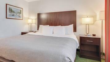 Desk, blackout drapes, iron/ironing board, bed sheets