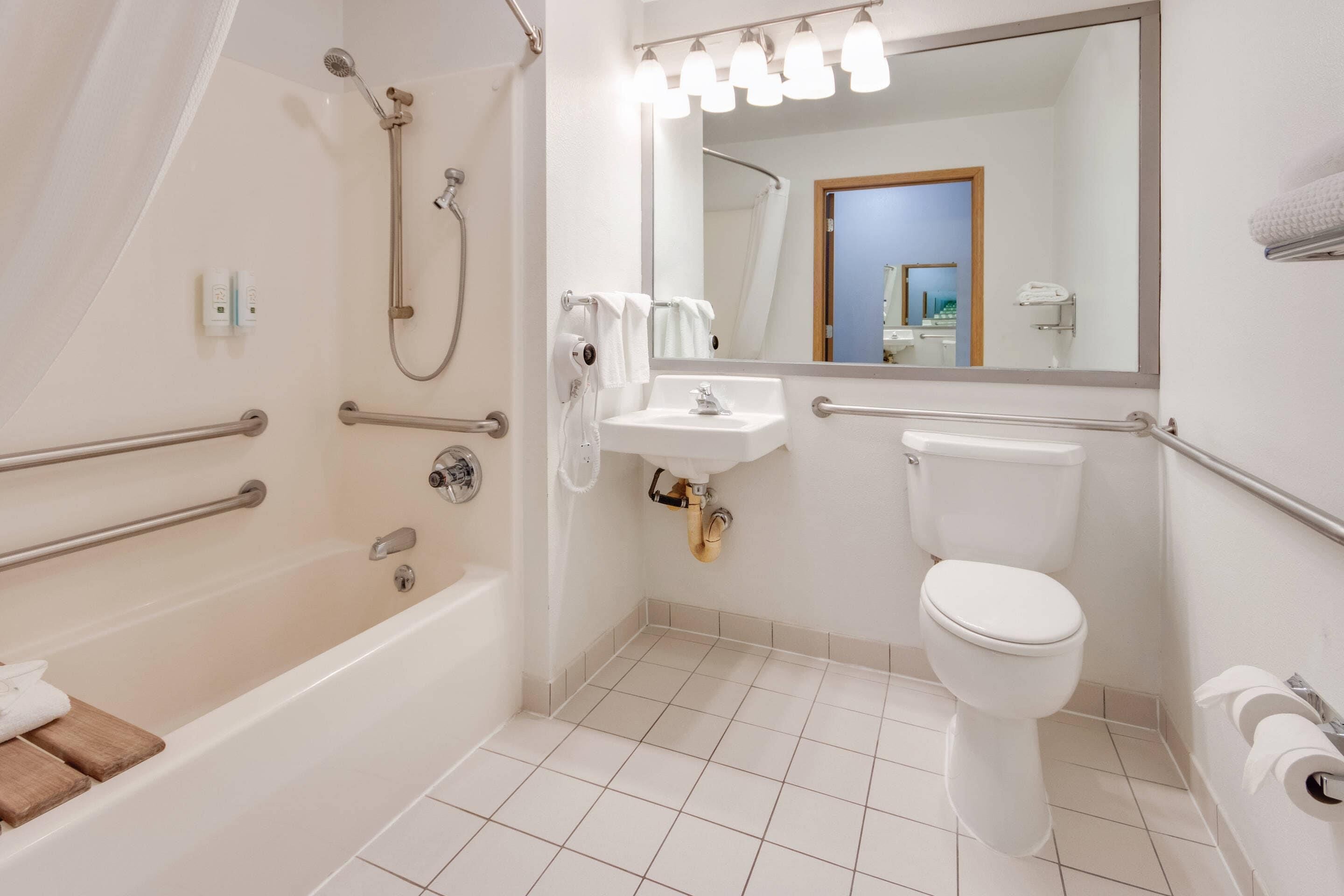 desk, blackout curtains, iron/ironing board, bed sheets