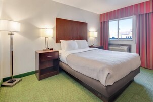 Desk, blackout curtains, iron/ironing board, bed sheets