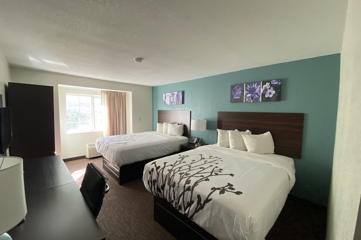 standard room, 2 queen beds, non smoking | desk, blackout curtains, iron/ironing board, cots/infant beds