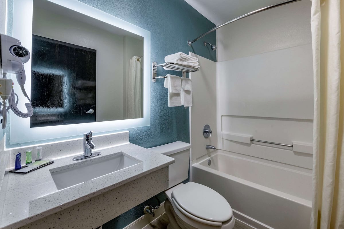 desk, blackout curtains, iron/ironing board, cots/infant beds