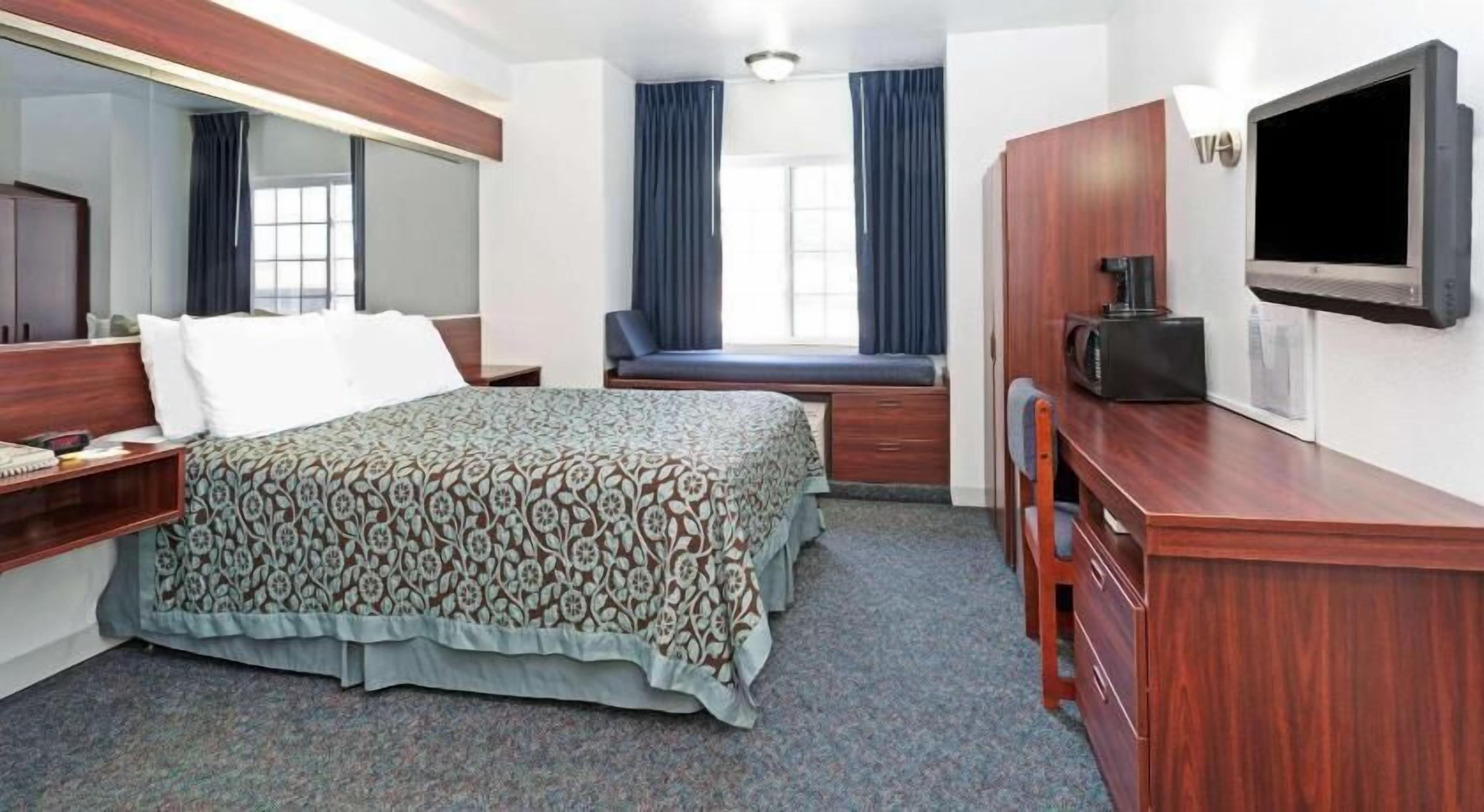 In-room safe, desk, laptop workspace, blackout curtains
