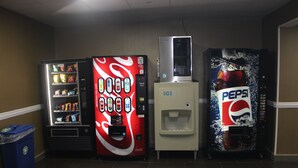 Four vending machines in a hallway, including Coca-Cola, Pepsi, and an ICE dispenser. - Quality Inn North Vernon near Hwy 50 (North Vernon)