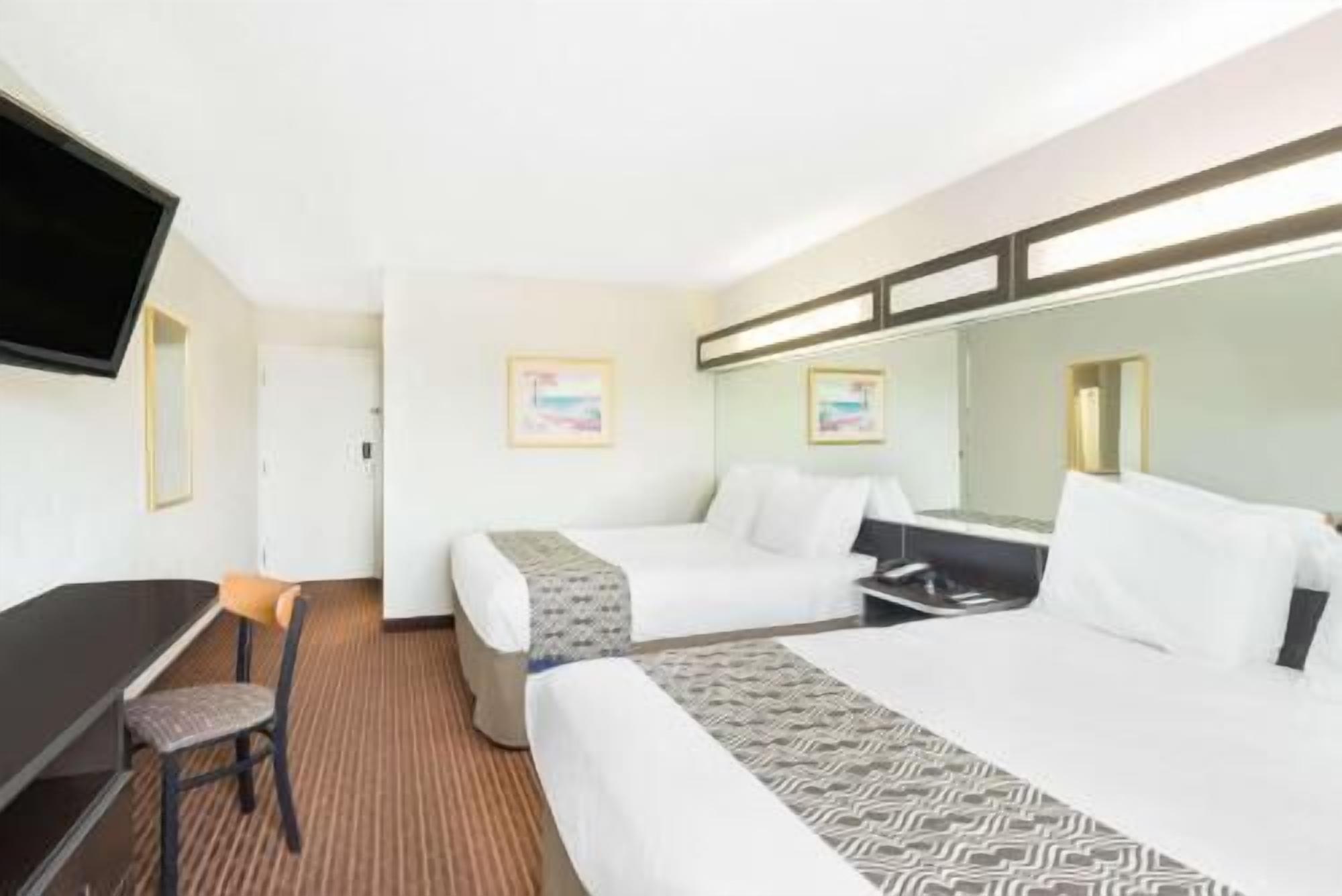 Pillow-top beds, desk, laptop workspace, iron/ironing board