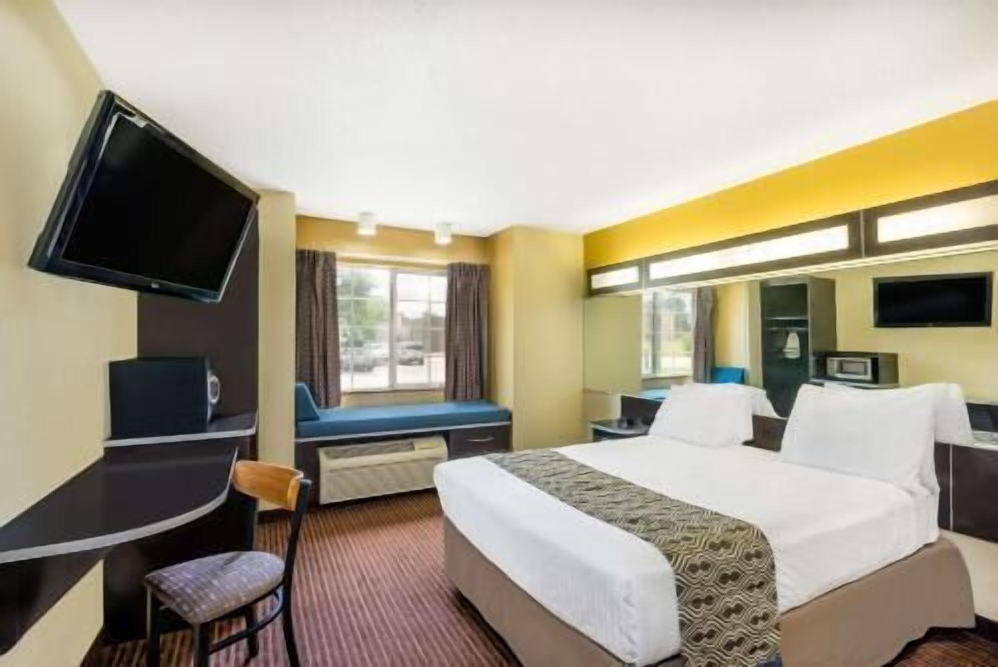 Pillow-top beds, desk, laptop workspace, iron/ironing board