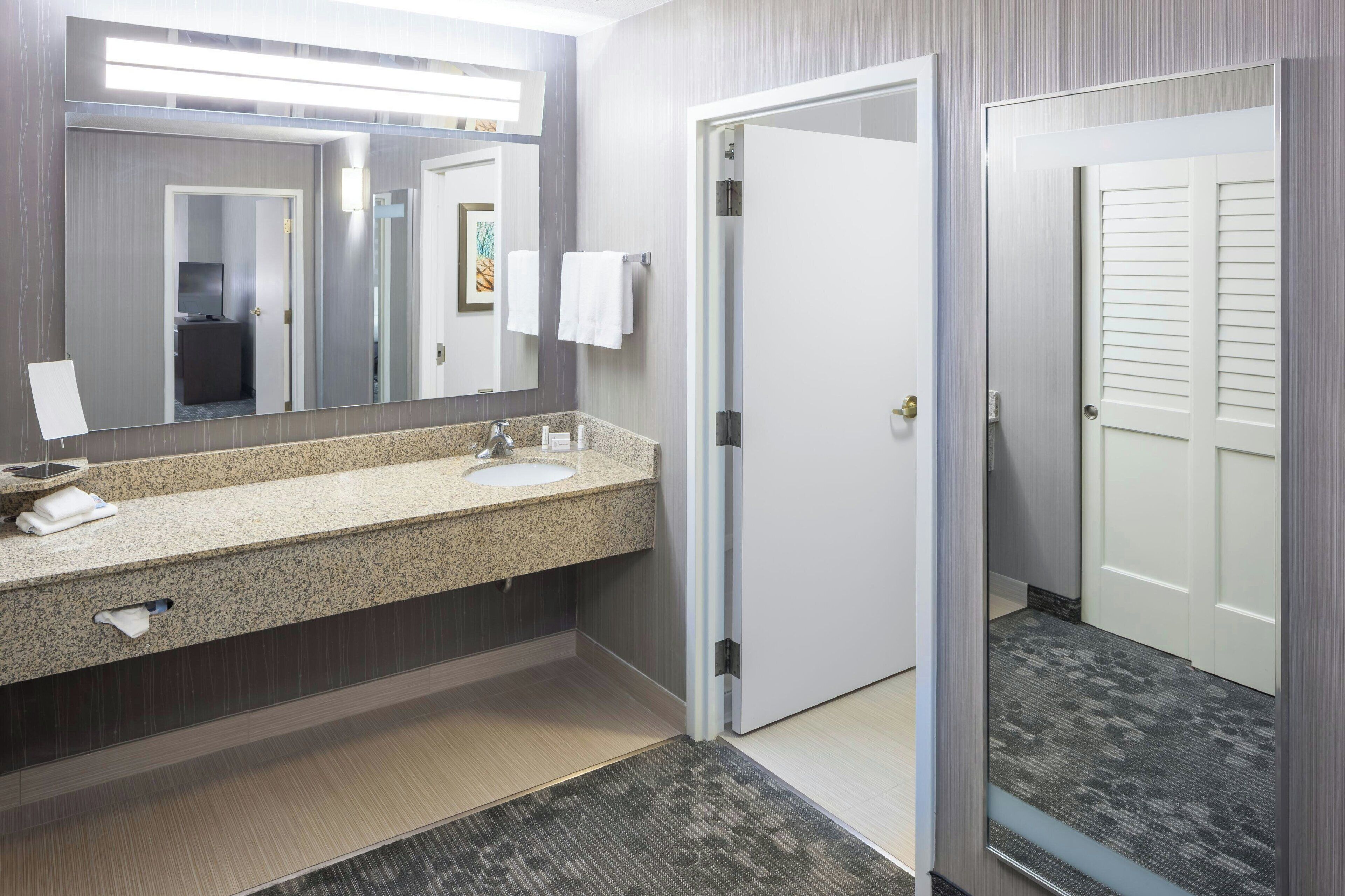 combined shower/bathtub, free toiletries, hair dryer, towels