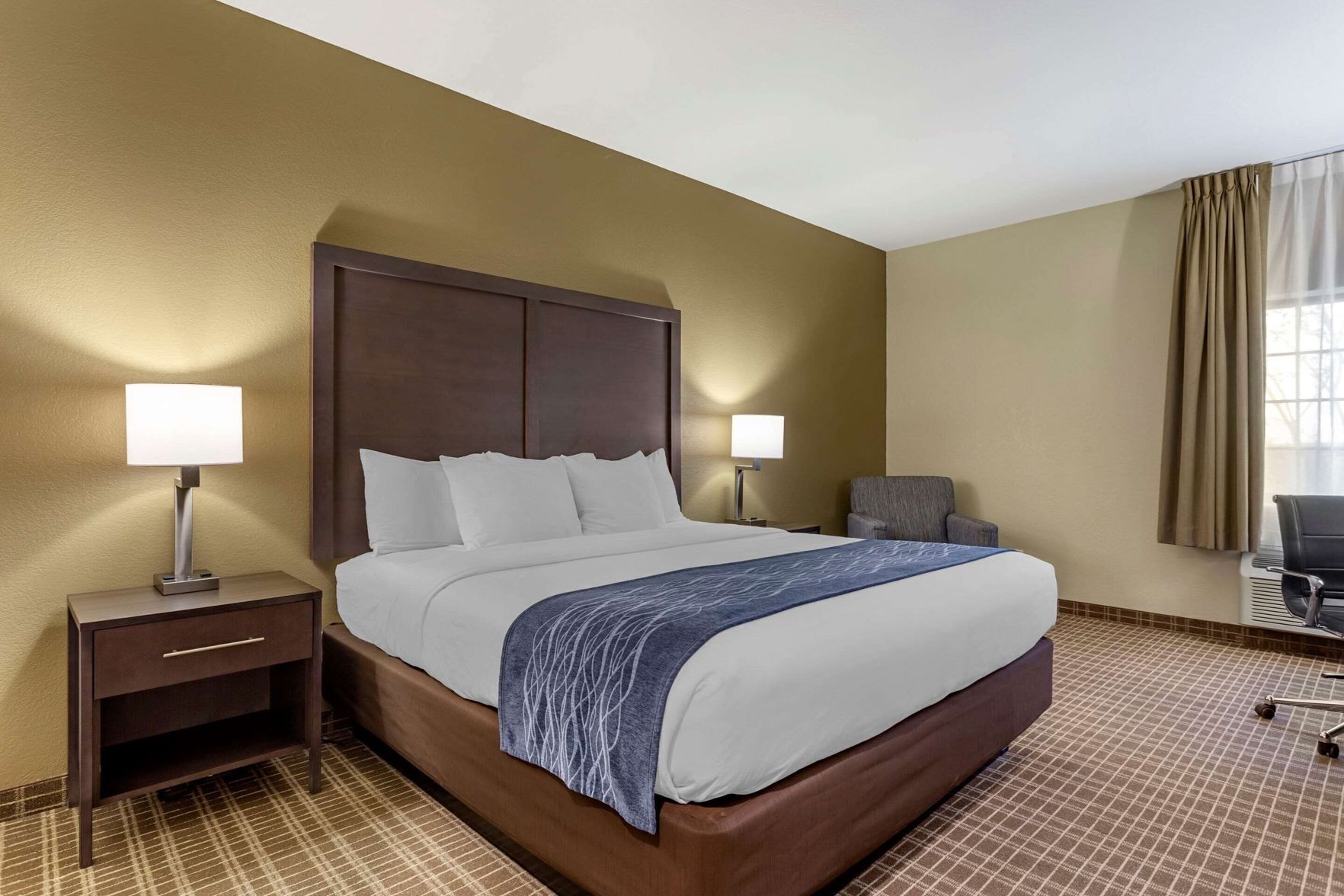 Pillow-top beds, desk, laptop workspace, blackout curtains