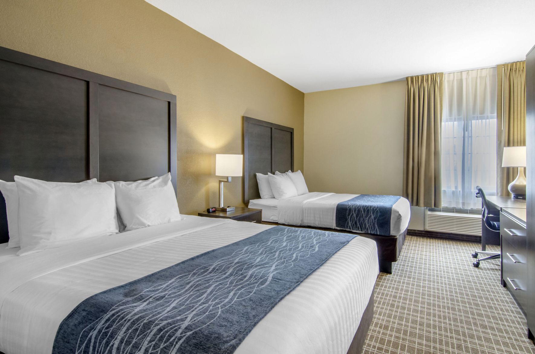 Pillow-top beds, desk, laptop workspace, blackout curtains