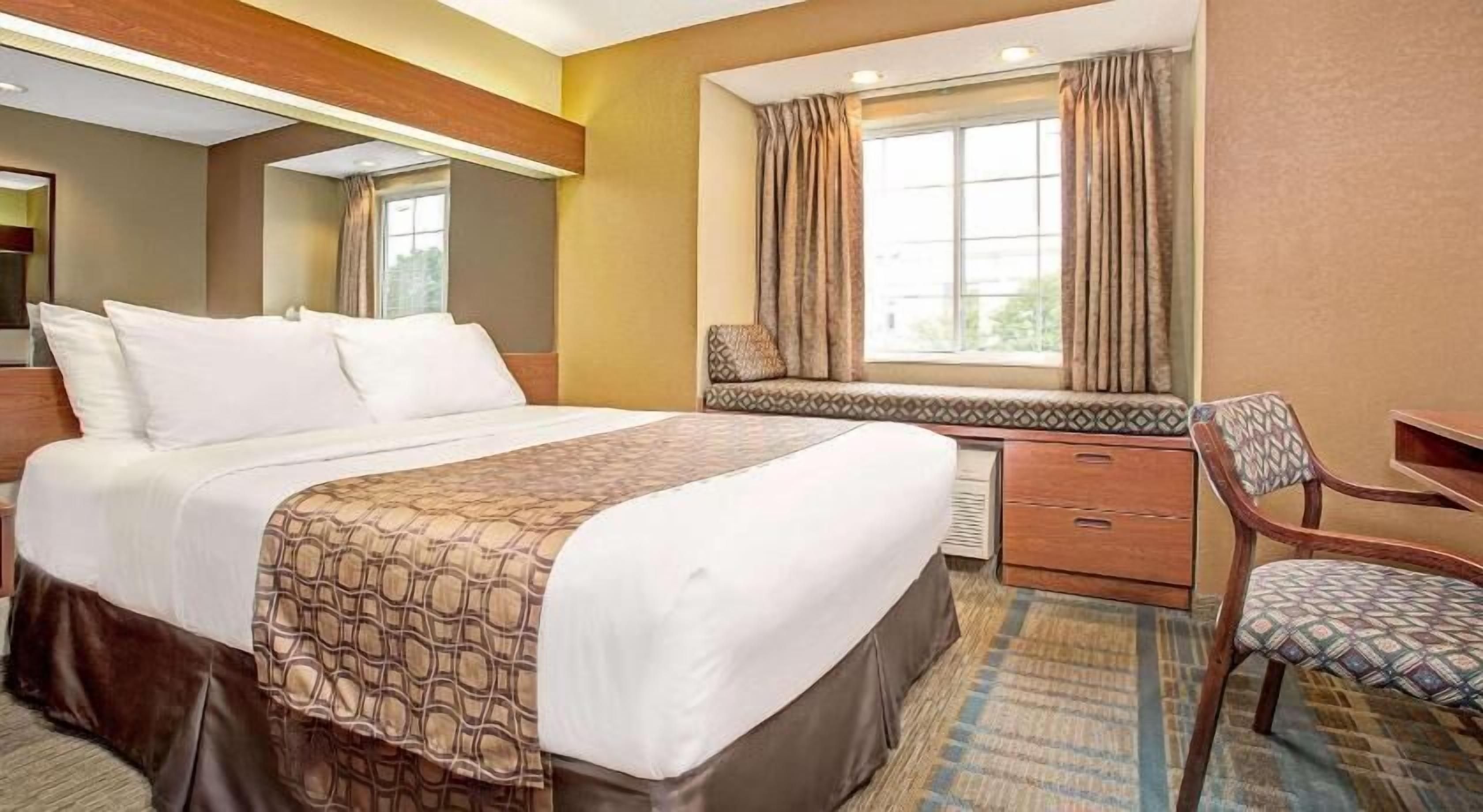 Desk, laptop workspace, blackout curtains, iron/ironing board