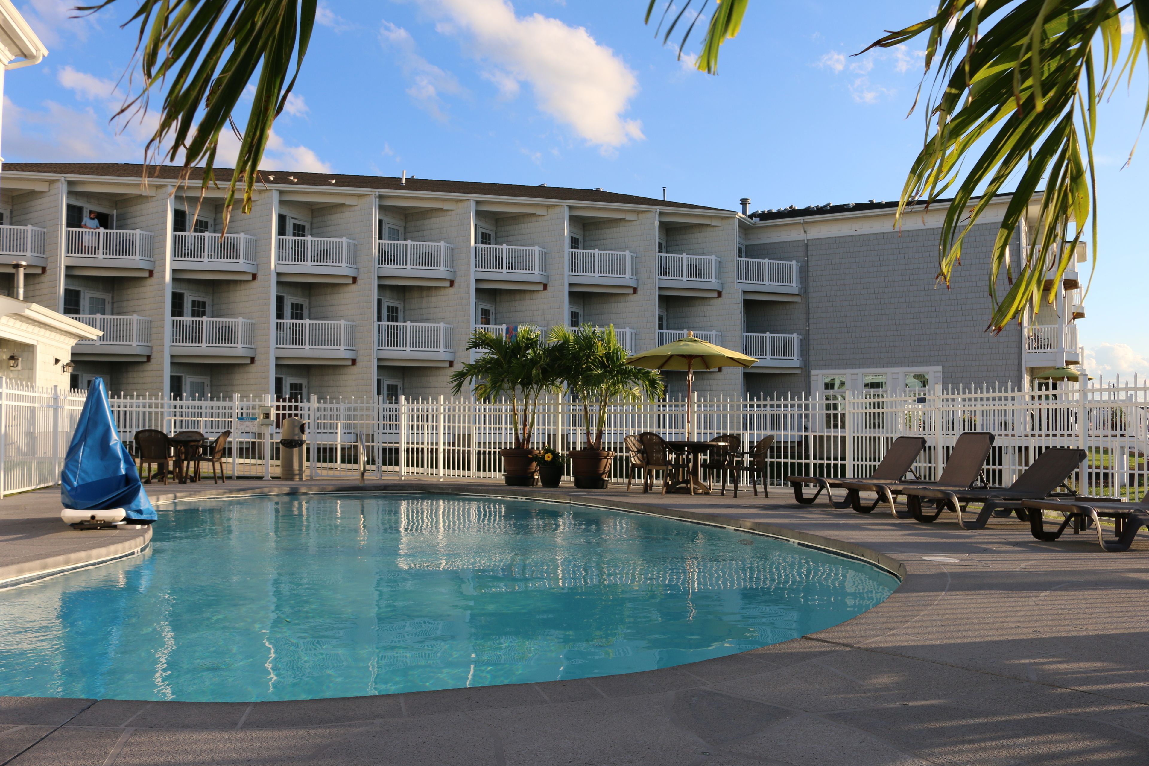 indoor pool, outdoor pool, pool umbrellas, pool loungers