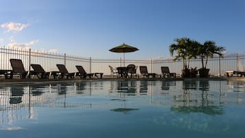 Indoor pool, outdoor pool, pool umbrellas, sun loungers