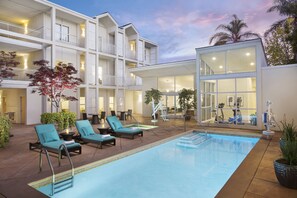 Outdoor pool, open 8:00 AM to 10:00 PM, sun loungers