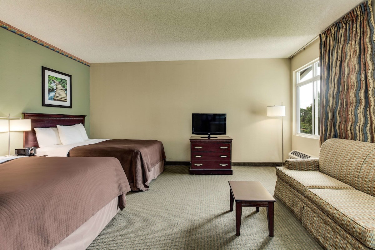 Suite, 2 Queen Beds, Non Smoking | Desk, laptop workspace, iron/ironing board, free WiFi