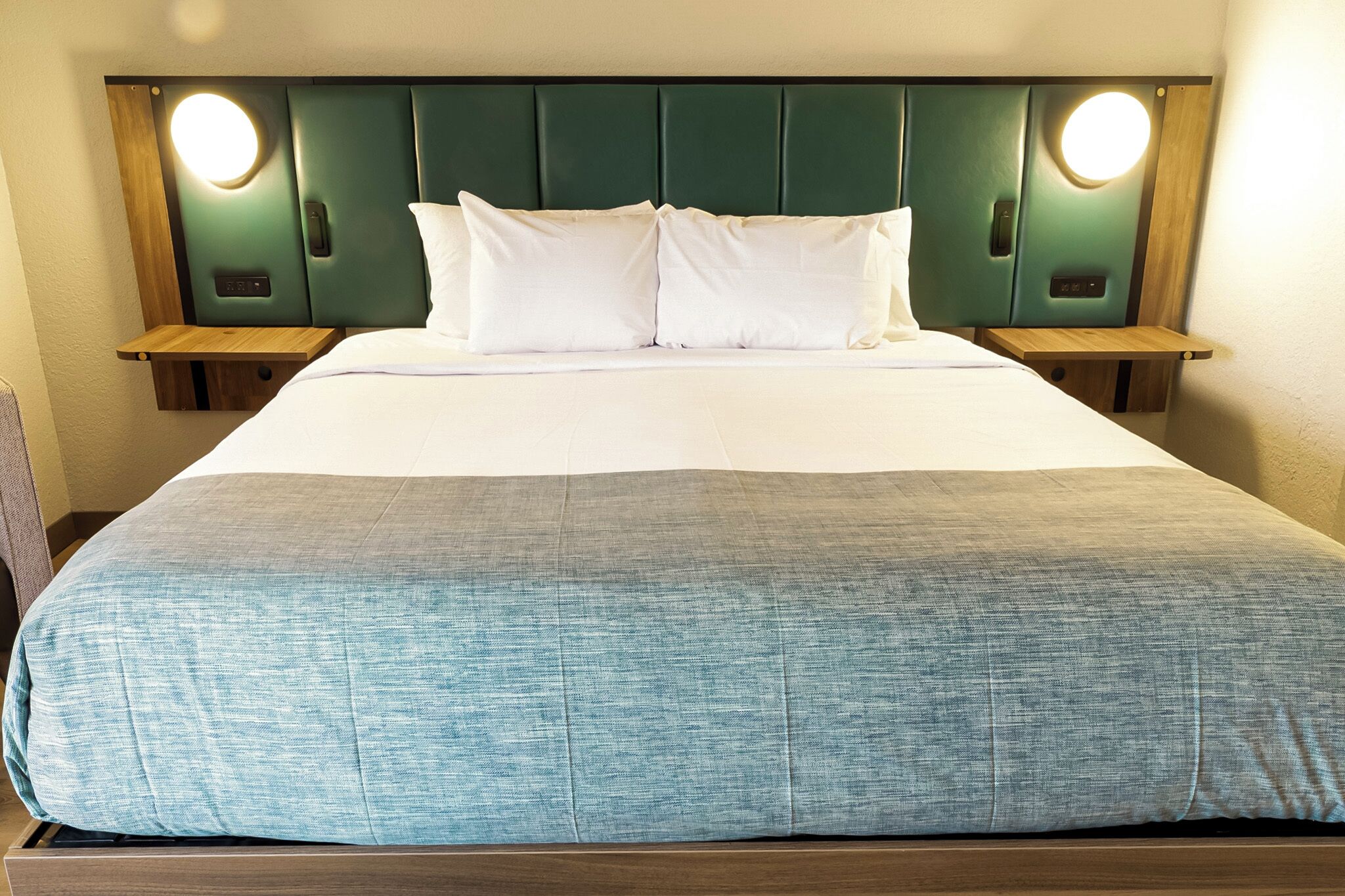 Desk, blackout drapes, iron/ironing board, free cribs/infant beds