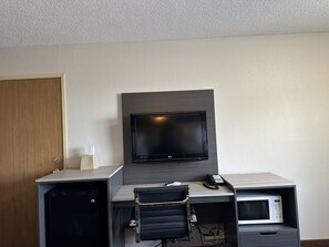 Desk, laptop workspace, blackout curtains, free WiFi