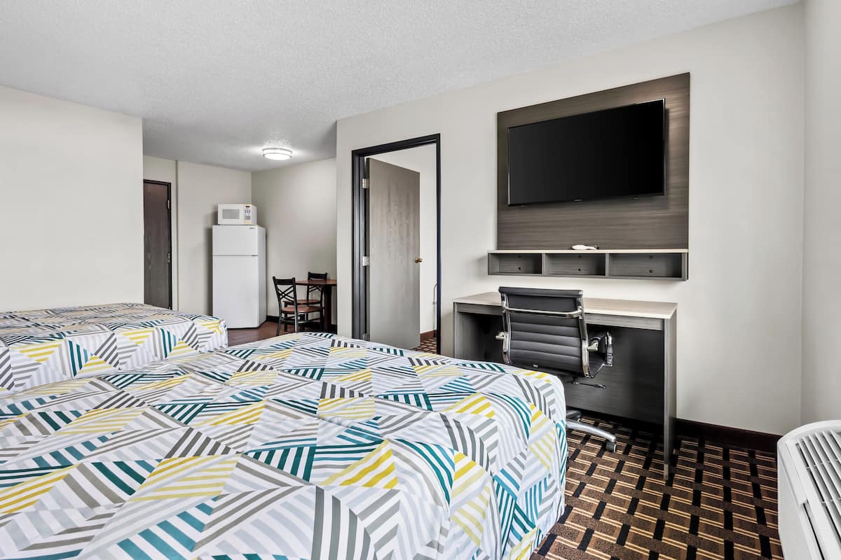 Desk, laptop workspace, blackout curtains, free WiFi