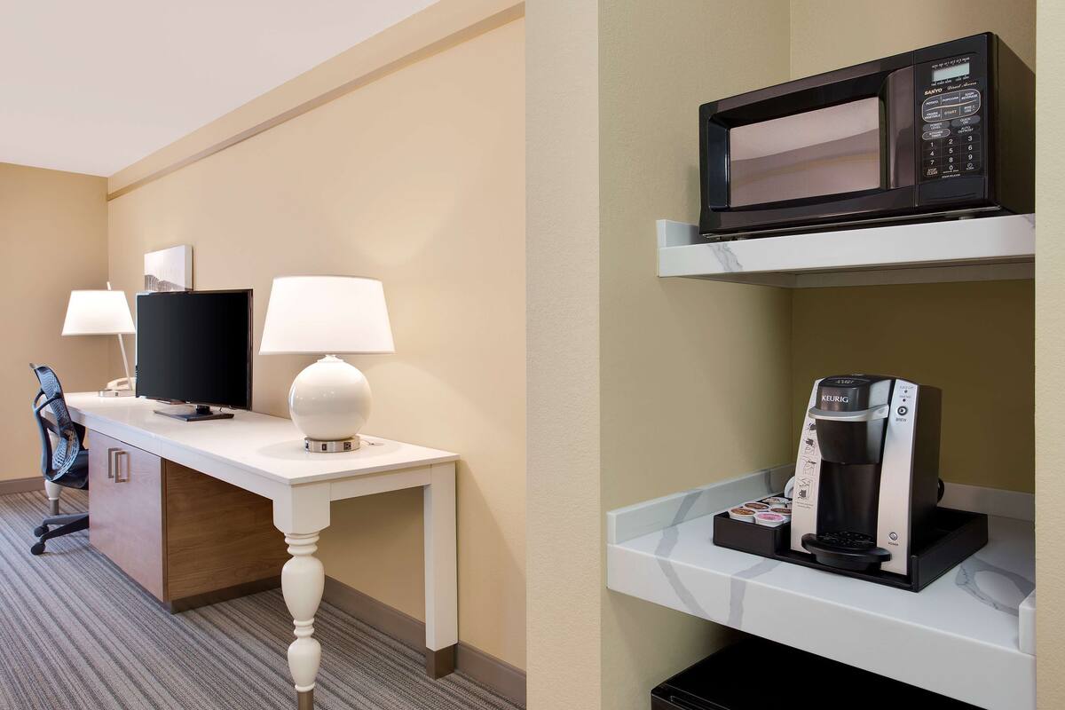 premium bedding, desk, laptop workspace, blackout curtains