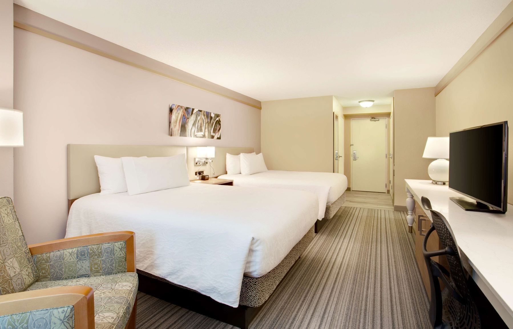 Premium bedding, desk, laptop workspace, blackout curtains