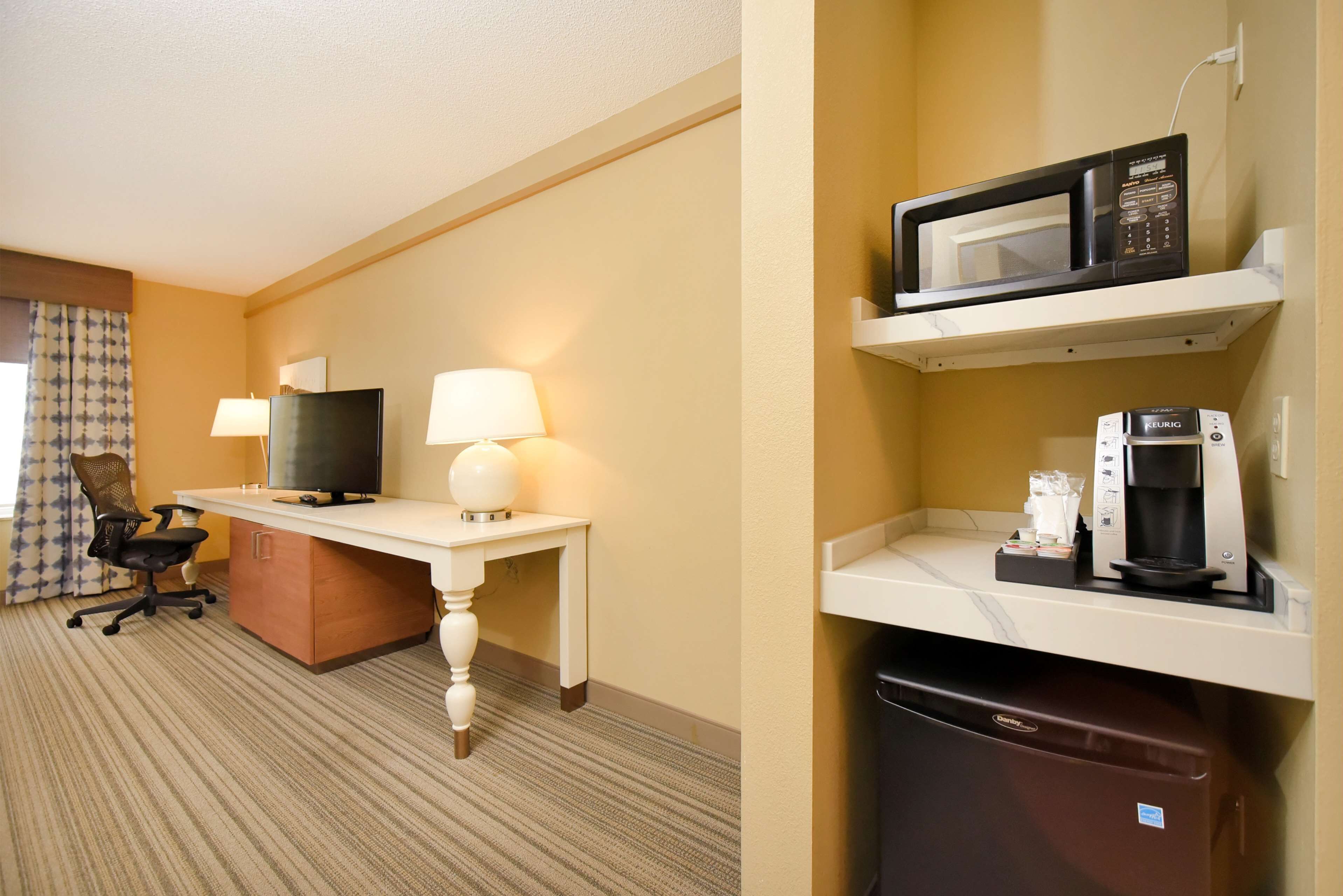 premium bedding, desk, laptop workspace, blackout curtains