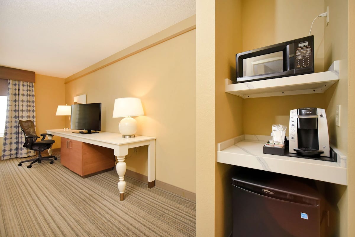 premium bedding, desk, laptop workspace, blackout curtains