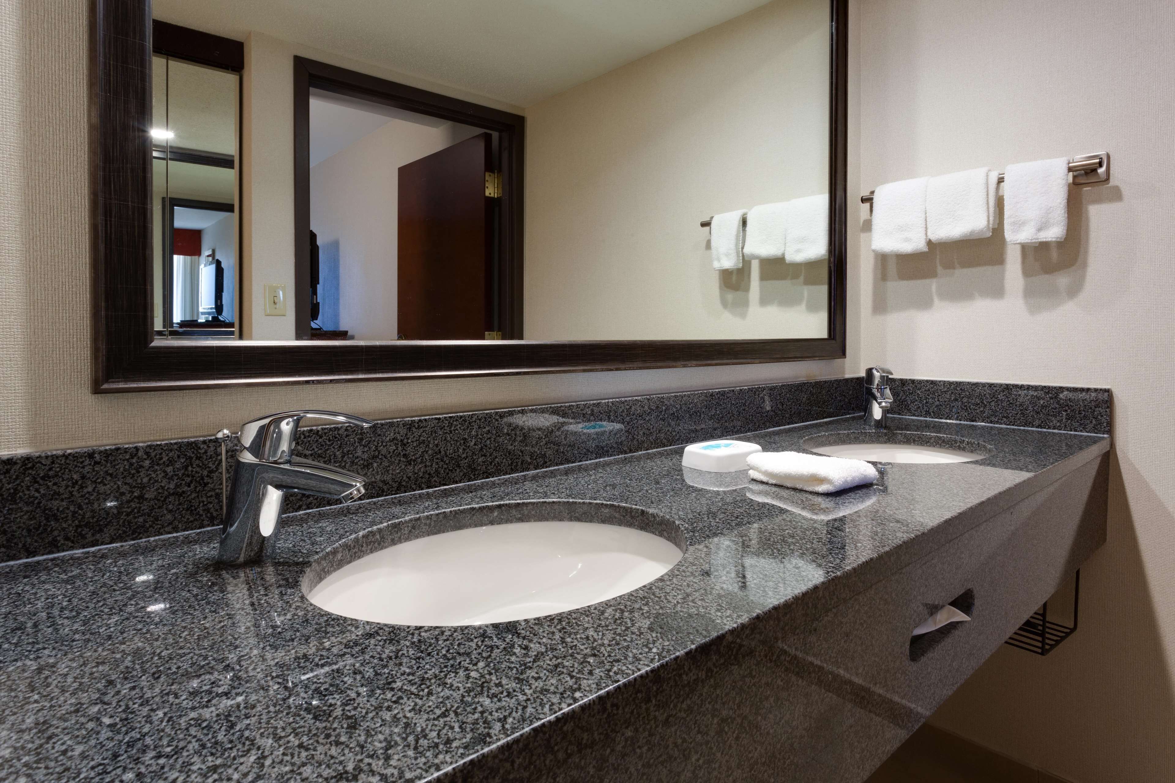 suite, 1 king bed with sofa bed, refrigerator & microwave (oversized room, upper floor) | bathroom | combined shower/bathtub, free toiletries, hair dryer, towels