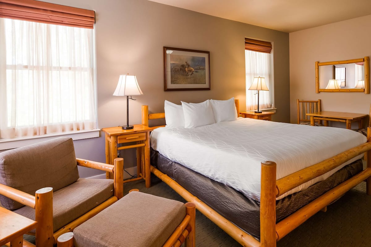 desk, laptop workspace, blackout curtains, iron/ironing board