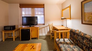 Desk, laptop workspace, blackout curtains, iron/ironing board