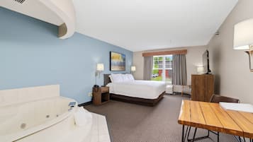 Deluxe suite, 1 kingsize bed, niet-roken | Lakens van Egyptisch katoen, luxe beddengoed, donzen dekbedden