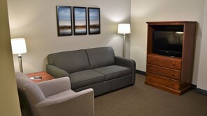Suite, 1 Bedroom | Living room | TV