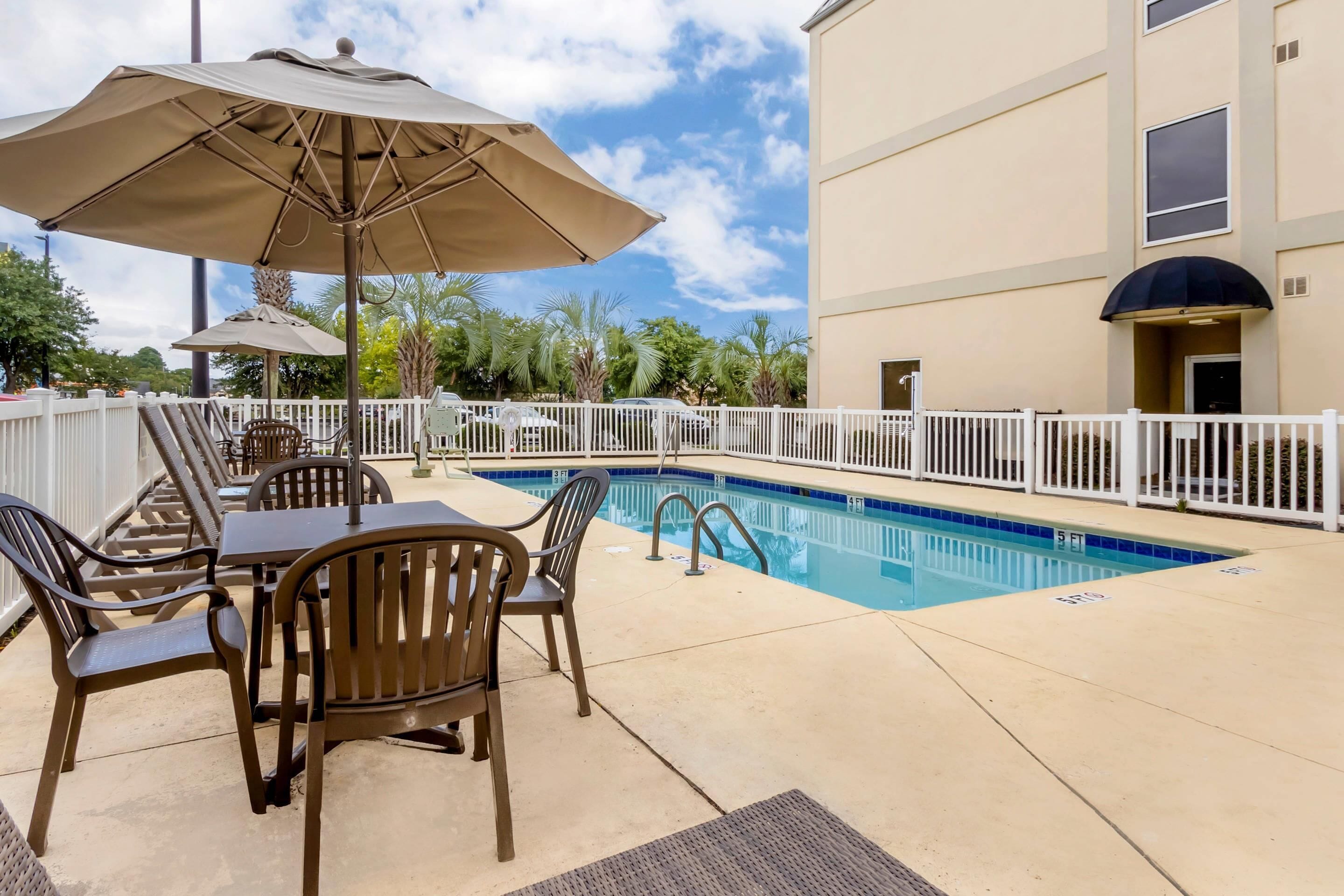 Seasonal outdoor pool, open 8 AM to 10 PM, pool umbrellas, sun loungers
