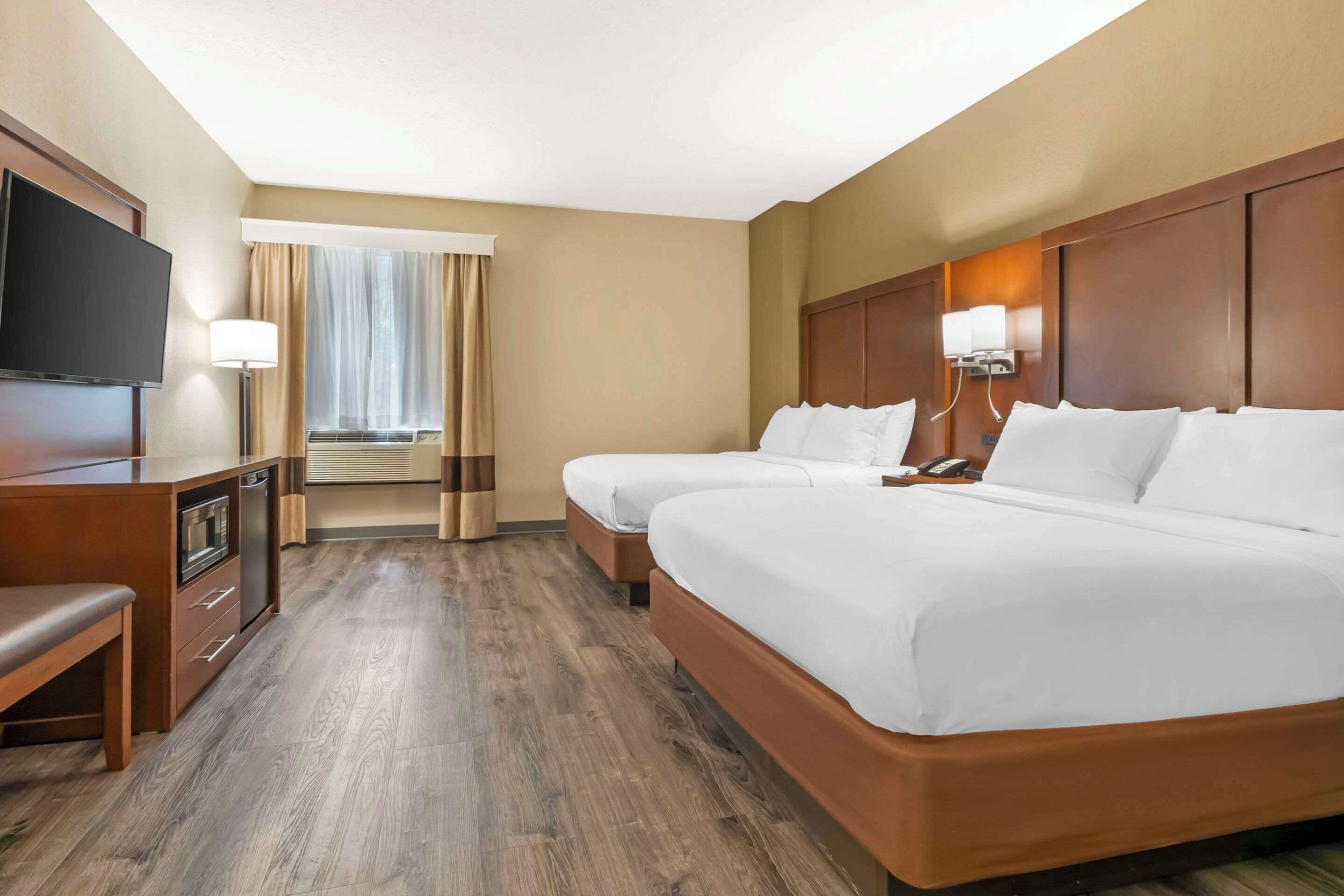 suite, 2 queen beds, non smoking | desk, laptop workspace, blackout curtains, iron/ironing board