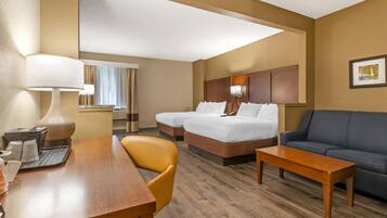 Suite, 2 Queen Beds, Non Smoking | Desk, laptop workspace, blackout drapes, iron/ironing board