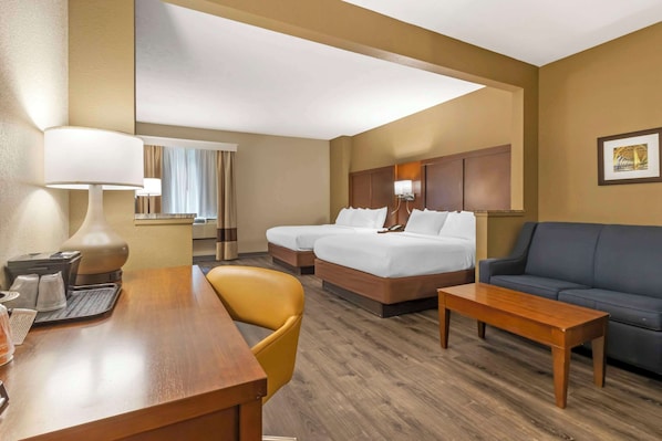 Suite, 2 Queen Beds, Non Smoking | Desk, laptop workspace, blackout drapes, iron/ironing board