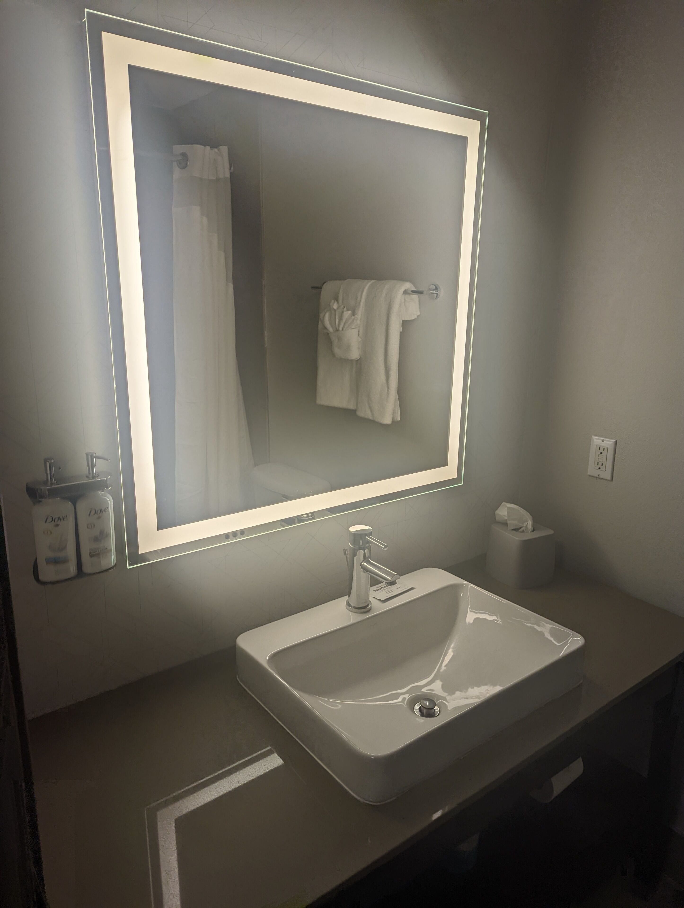 combined shower/bathtub, hair dryer, towels, soap