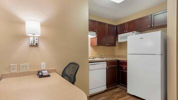 Suite, 1 King Bed with Sofa bed, Non Smoking | Private kitchen | Fridge, microwave, stovetop, coffee/tea maker