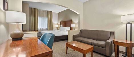 Suite, 1 King Bed, Non Smoking | Desk, laptop workspace, iron/ironing board, free WiFi