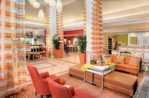 Relax in our inviting lobby with a comfortable seating area, coffee station, and reception desk.