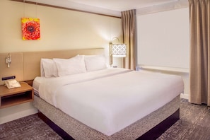Junior Suite, One King Bed, Non-Smoking | Pillow-top beds, in-room safe, desk, blackout curtains