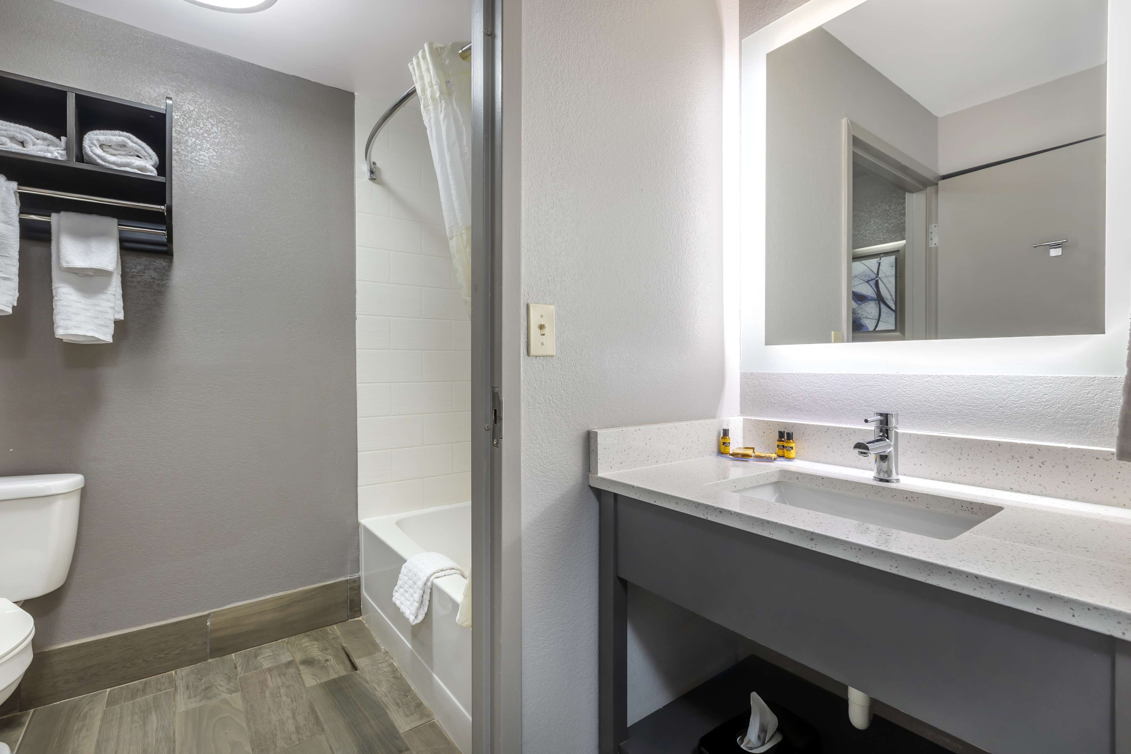 standard room, 2 queen beds, non smoking, microwave | bathroom | free toiletries, hair dryer, towels