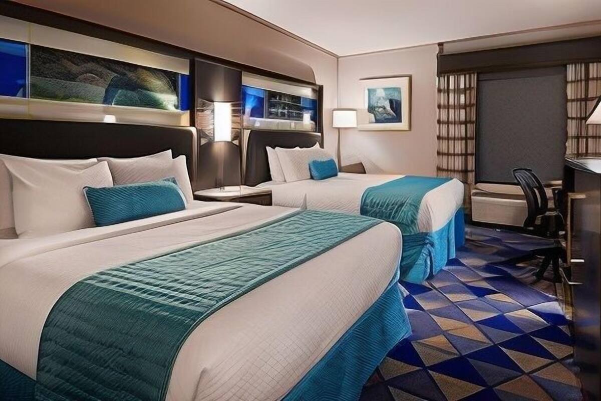 Desk, laptop workspace, blackout drapes, iron/ironing board