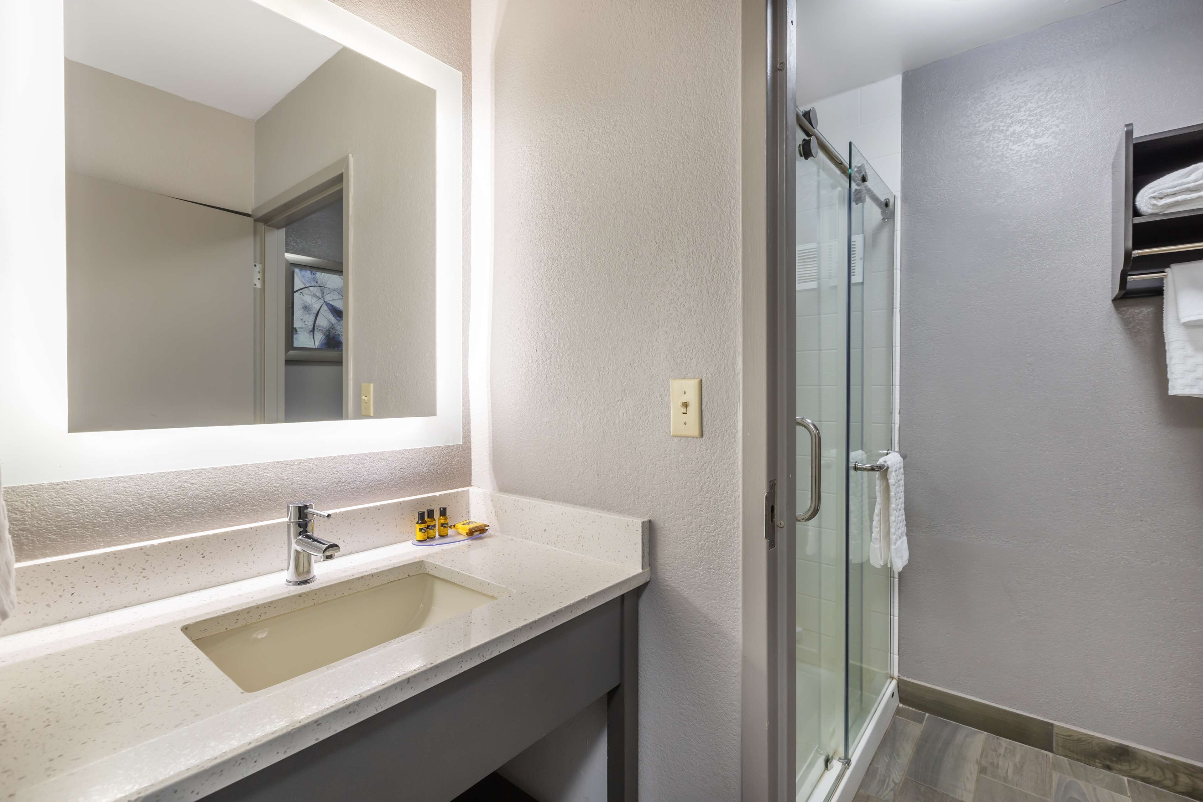 standard room, 2 queen beds, non smoking, refrigerator & microwave | bathroom | free toiletries, hair dryer, towels