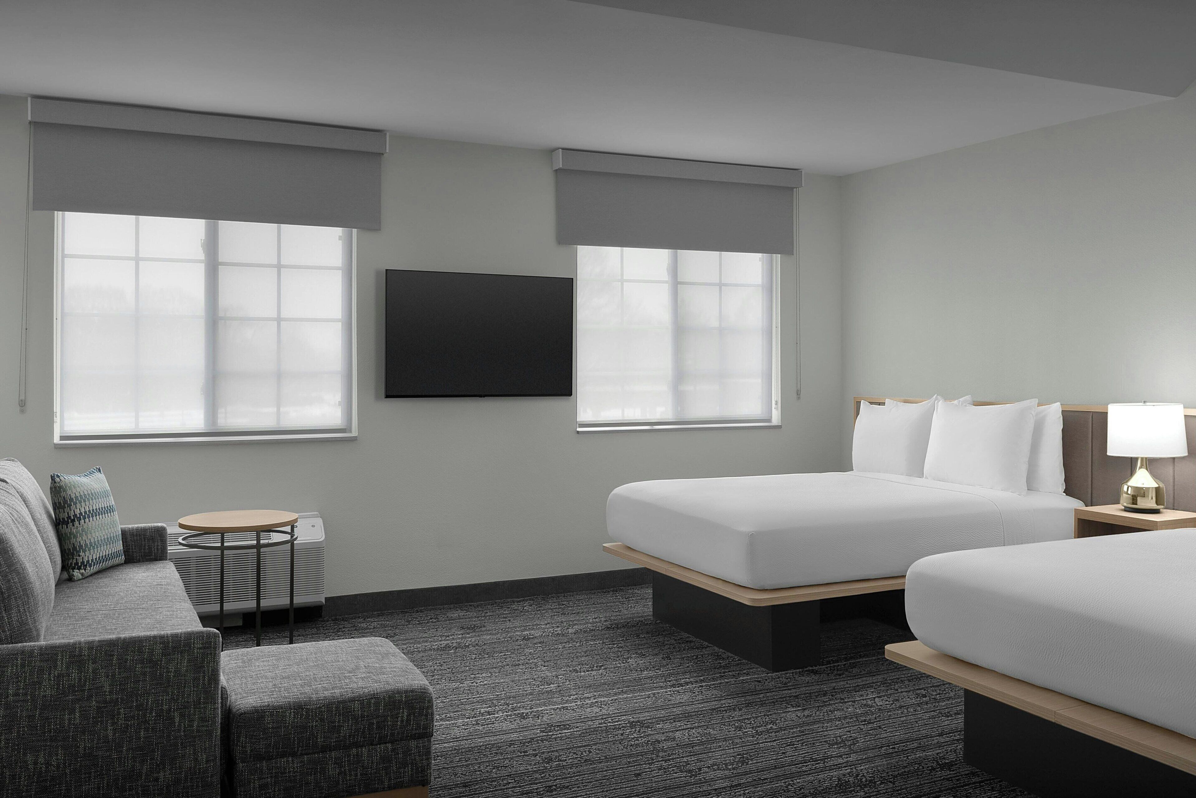 Desk, laptop workspace, blackout drapes, iron/ironing board