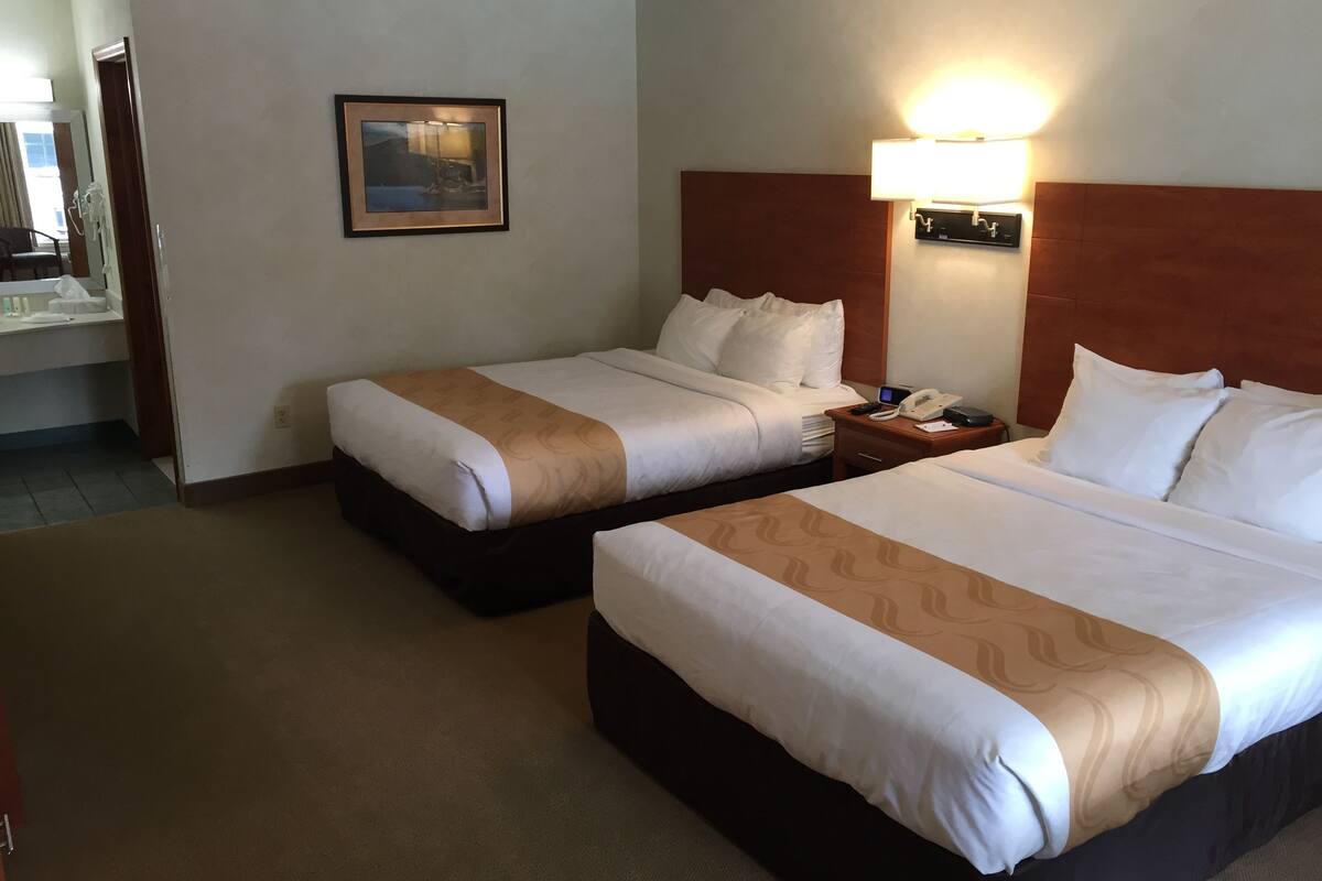 standard room, 2 queen beds, non smoking | in-room safe, blackout curtains, soundproofing, iron/ironing board