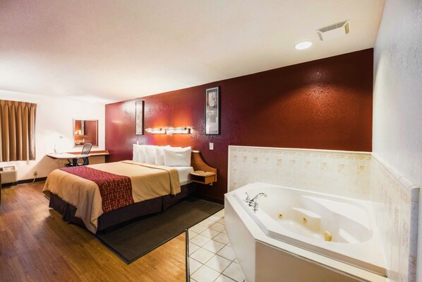 Superior Suite, 1 King Bed, Jetted Tub (Smoke-Free) | Laptop workspace, soundproofing, iron/ironing board, bed sheets