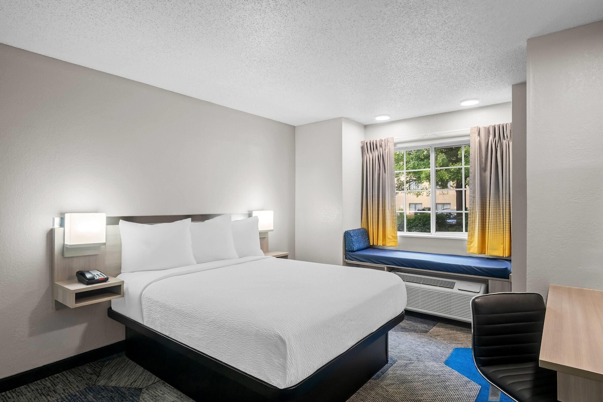 Hypo-allergenic bedding, pillow-top beds, desk, laptop workspace