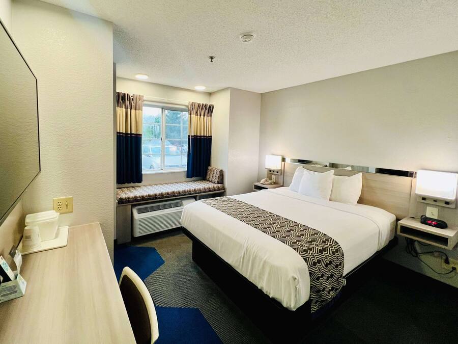 Hypo-allergenic bedding, pillowtop beds, desk, laptop workspace