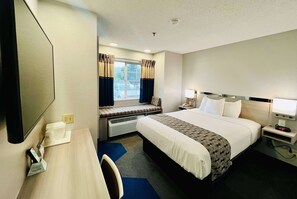 Hypo-allergenic bedding, pillowtop beds, desk, laptop workspace