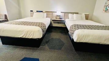 Hypo-allergenic bedding, pillow-top beds, desk, laptop workspace