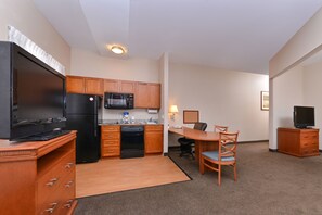 Desk, laptop workspace, blackout drapes, iron/ironing board